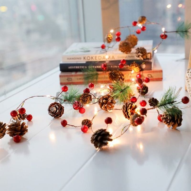 Simple Christmas decoration with pinecones and fairy lights